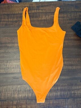 Women's Orange Scoop Neck Bodysuit